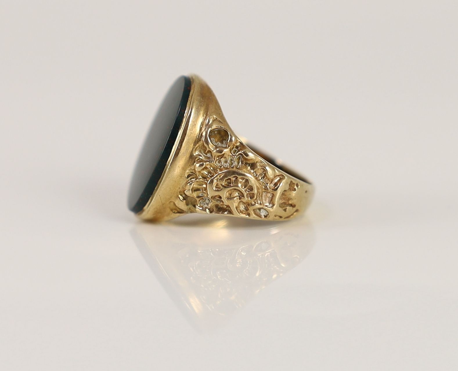 A 1970's 9ct gold and oval bloodstone set signet ring